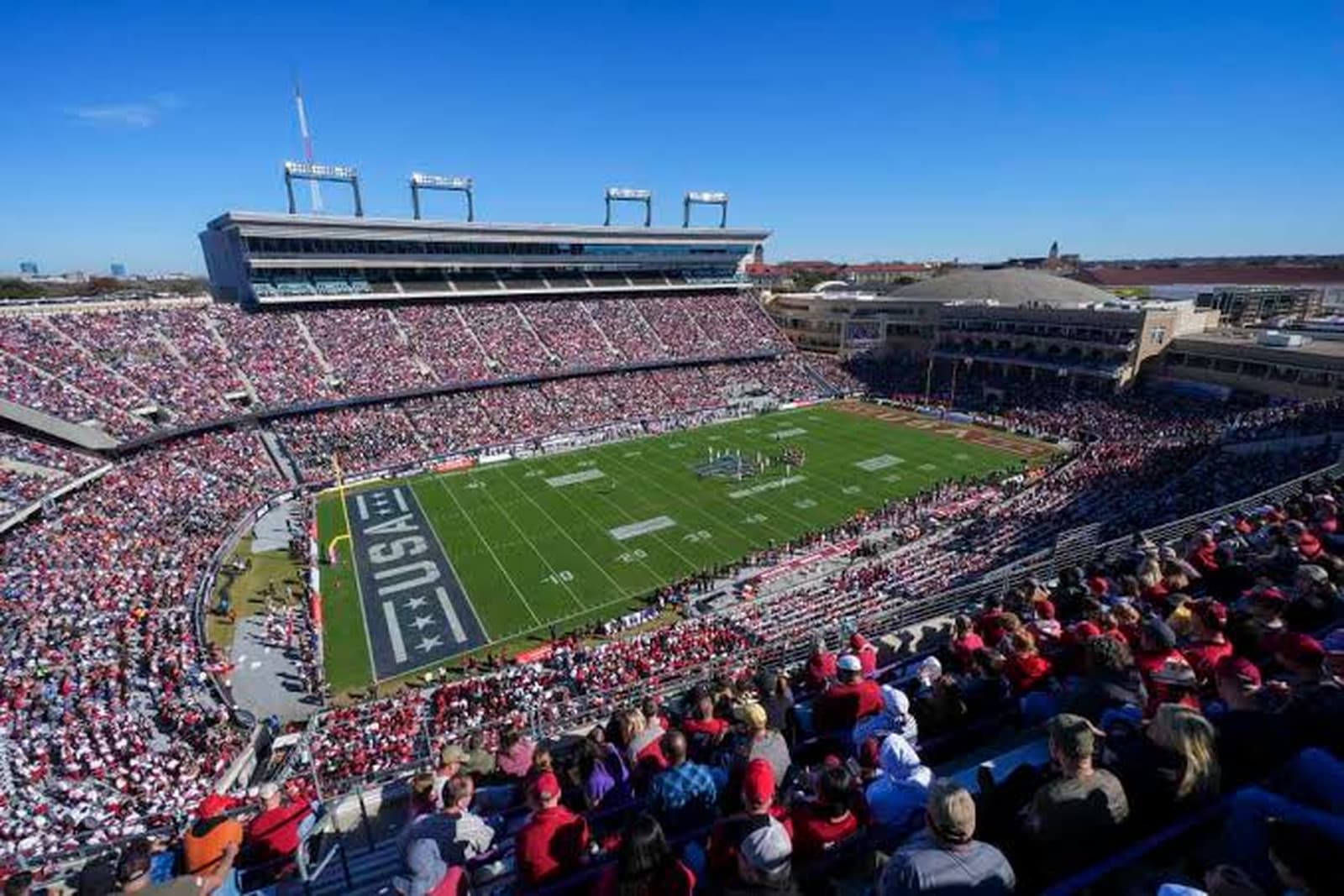 College Football Is a Global Business Now. The Players Are Still Treated Like Amateurs.